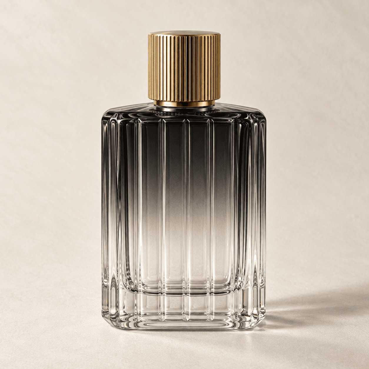 Glass fragrance bottle with a smoke-to-clear gradient coating